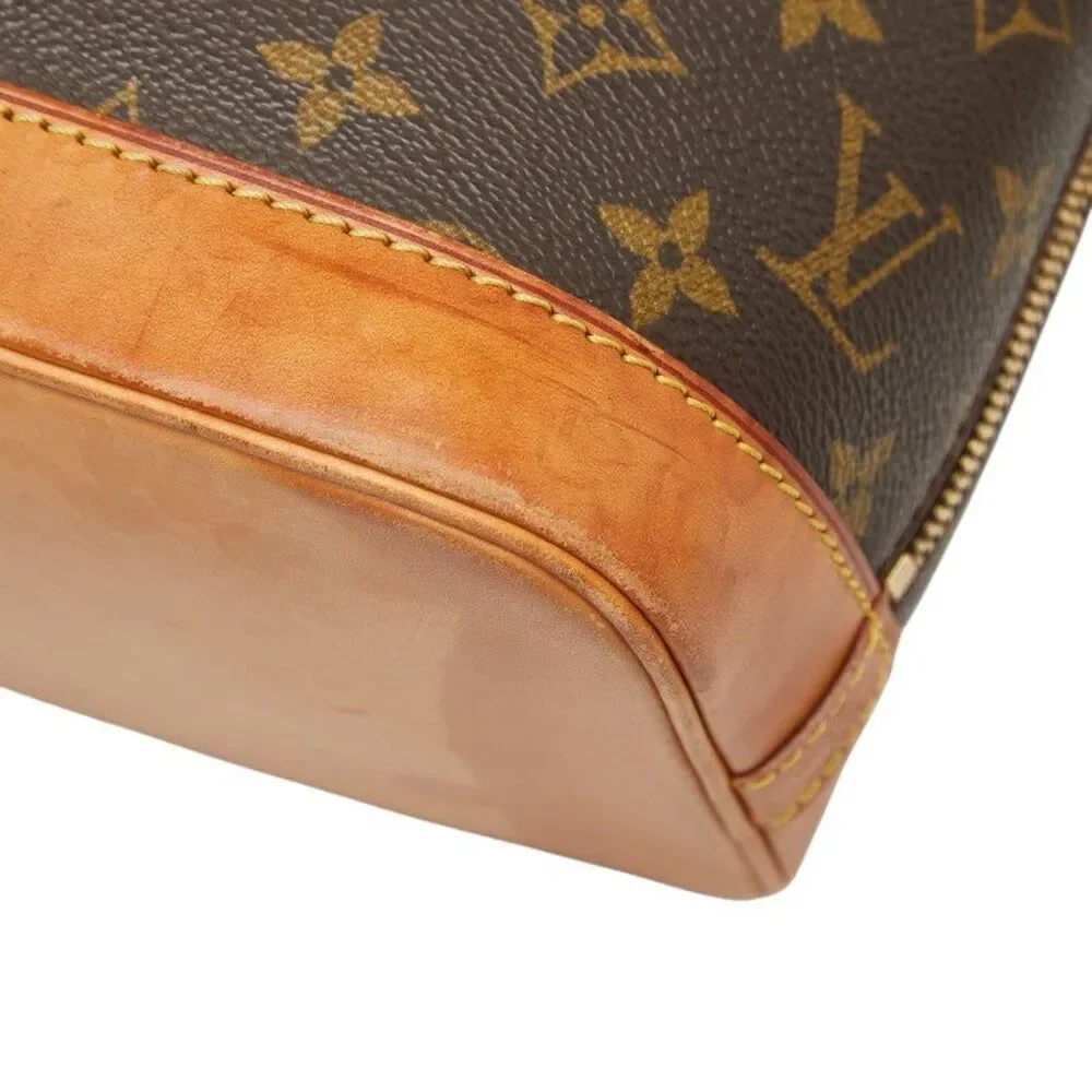 Louis Vuitton Alma PM Handbag